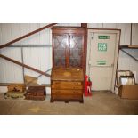 An Edwardian inlaid mahogany bureau bookcase