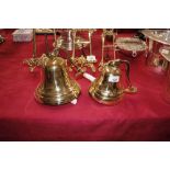 Two graduated hanging brass bells