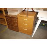 A pine effect three drawer bedside chest
