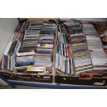 Two boxes of CDs