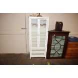 A modern white display cabinet fitted two drawers