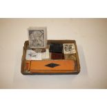 A box containing quill pens, watch, costume jewellery etc.