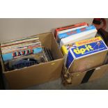A box of various children's games, LP and 45rpm re