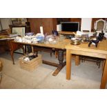 An oak refectory dining table raised on baluster e