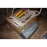 A quantity of rope; various tools; metal toolbox e