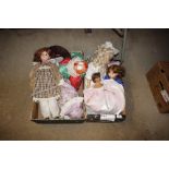 Two boxes of various dressed dolls