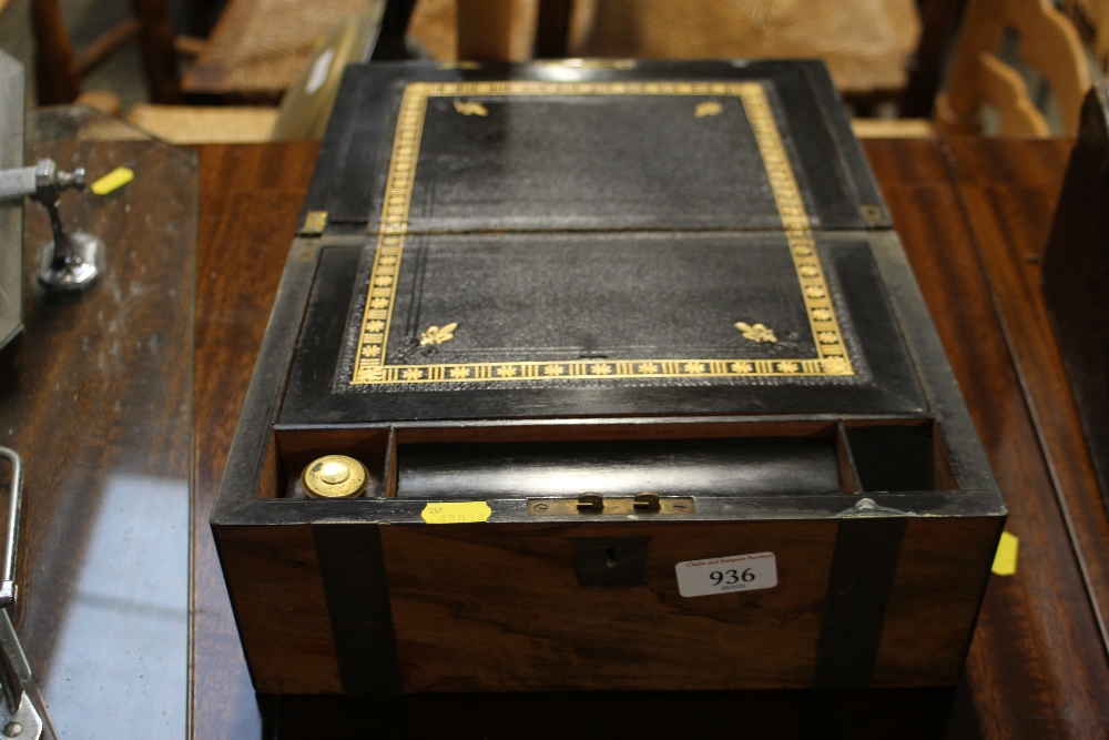 A Victorian walnut and brass banded writing box