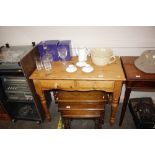 A stripped pine side table fitted two drawers