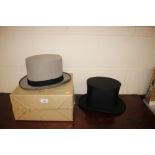 A Moss bros grey top hat with original cardboard b