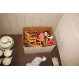 A box containing various dressed dolls, miniature dolls house furniture etc.