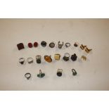 A quantity of various white metal dress rings etc.