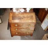 A Georgian mahogany and cross banded bureau fitted