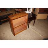 A reproduction nest of two tables; and an open fronted bookcase