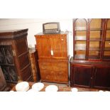 A mahogany linen cabinet on chest by Hicks of Dubl