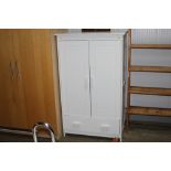 A modern white linen cupboard