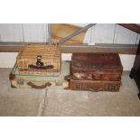 Three vintage suitcases and a wicker hamper