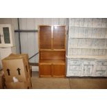 A teak side cabinet