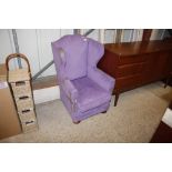 A child's wing back chair AF