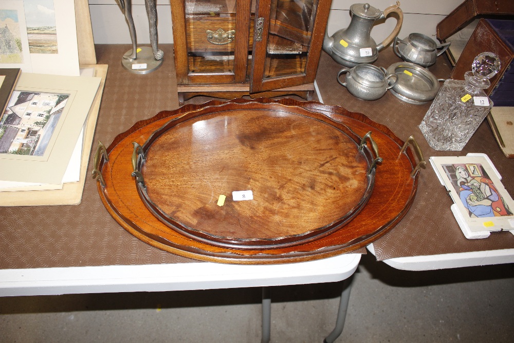 Two mahogany twin handled drinks trays