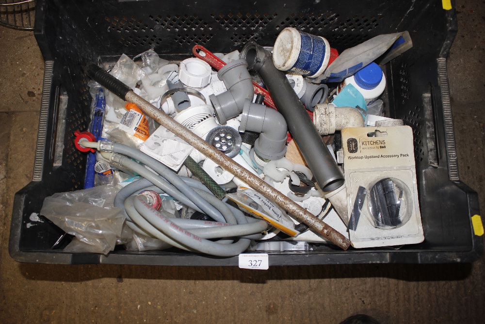 A crate of various pumping fittings etc
