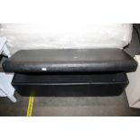 A black faux leather upholstered ottoman AF; and