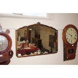 A walnut framed wall mirror