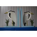 A pair of bird book ends