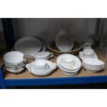 A quantity of white glazed china