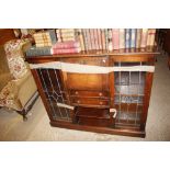 A 20th Century oak side-by-side bureau bookcase wi