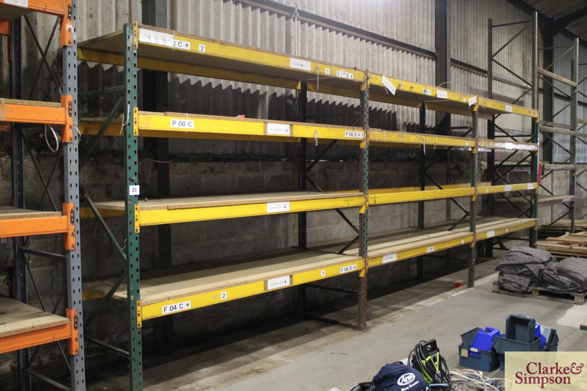 c.8.5m of pallet racking. Comprising of 4x uprights and 12x shelves (some with chipboard). To be