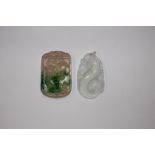 Two jade coloured pendants