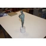 A modernist bronze sculpture on alabaster base