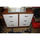 A pair of laminated three drawer bedside chests