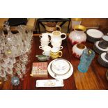 Miscellaneous dinnerware; a Sudoku game; etc.