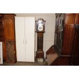 A modern mahogany cased chiming grandmother clock