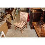 A cane seated bedroom chair with loose cover