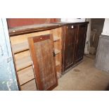 A pitch pine storage cupboard; and another similar