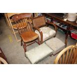 A 1930's low armchair with rattan back; two uph