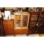 A 1930's oak and leaded glazed bookcase