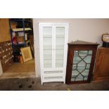 A modern white display cabinet fitted two drawers