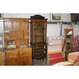 An Edwardian inlaid mahogany china display cabinet