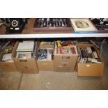 Five boxes of miscellaneous books; Warlord; and ot