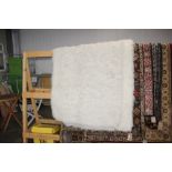 A Greek Flokati woollen pile rug, approx, 5'10" x