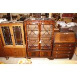 A reproduction mahogany bookcase