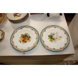 A pair of Victorian cabinet plates, retailed by Al