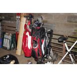 A large quantity of golf clubs in carrying bags; a
