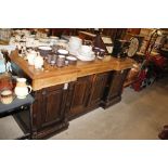 A late Victorian light oak break front sideboard