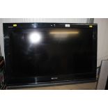 A Sony Bravia wall mounted tv - lacking brackets a