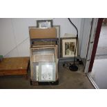 A large collection of picture frames, prints and w