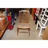 An Edwardian inlaid bedroom chair